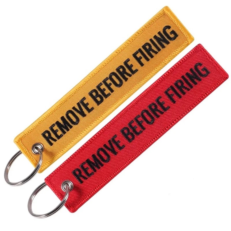 "REMOVE BEFORE FIRING" Keychain - portachiavi ricamato ambo i lati